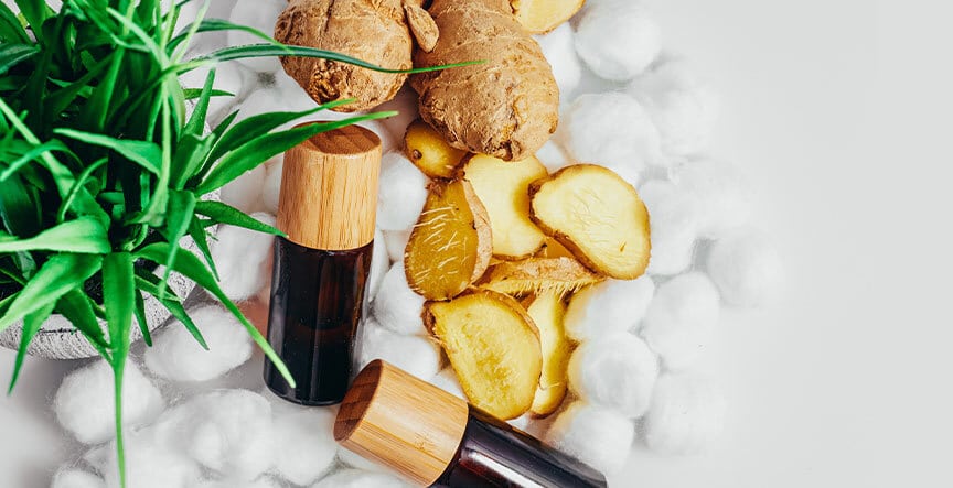 pyurvana essential oils near ginger and small plant