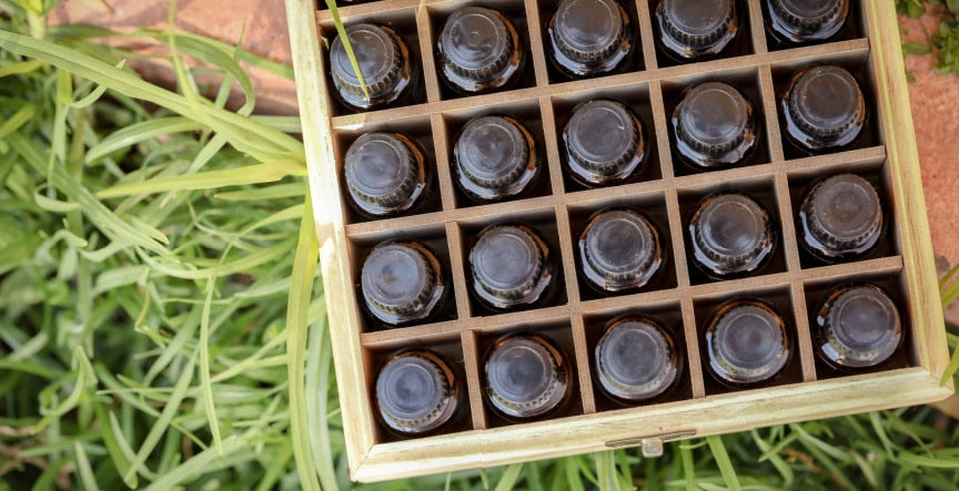 pyurvana essential oils kept inside the box on the wall