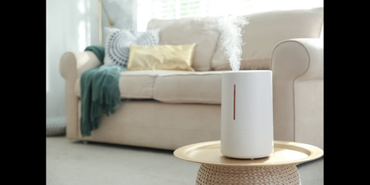 humidifier on a table being operated in a living room 