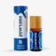 bottle of a copaiba Pyurvana essential oil 15ml next to a cardboard tube